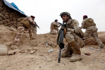 جنود عراقيون اثناء اشتباكات مع داعش (رويترز)