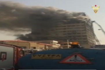 انهيار مبنى تجاري في طهران
