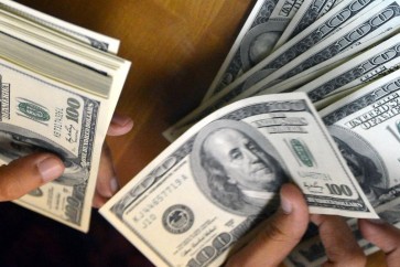 الدولار يرتفع أمام سلة العملات الرئيسية